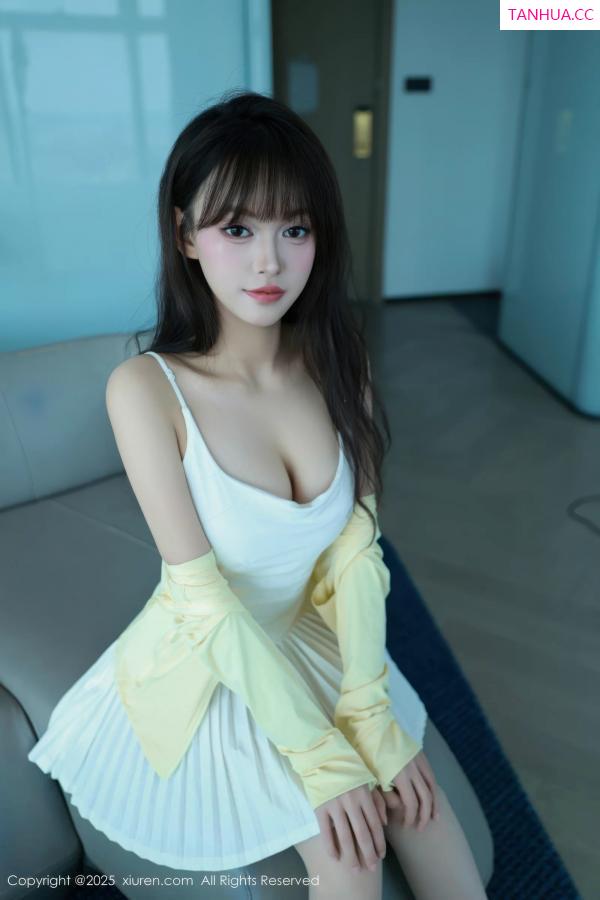   [XiuRen]高清写真图 2025.08.28 No.10702 糯咪 白色短裙第18张图片